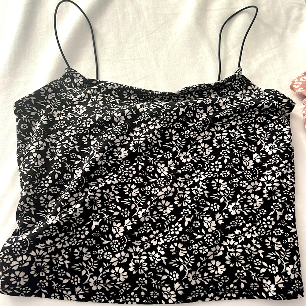 These are two crop tops that are from Gaze! Pink and Black both XS! Worn once.